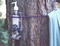 Softsoap and a towel tied to a tree with our spiggot